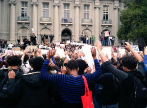 Google Image: Berkeley High students in a moment of a silence at City Hall, 12/2014